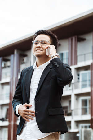 Concept Business - Business man serious talking with his projectの写真素材