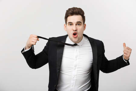 Business situation Concept: Frustrated business person angrily yelling at camera.の写真素材