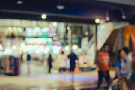 Abstract blurred people walking in shopping centerの写真素材