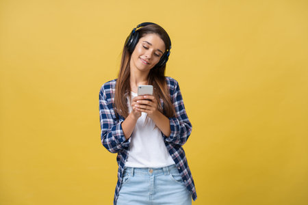 Lifestyle Concept - Portrait of beautiful caucasian woman joyful listening to music on mobile phone....
