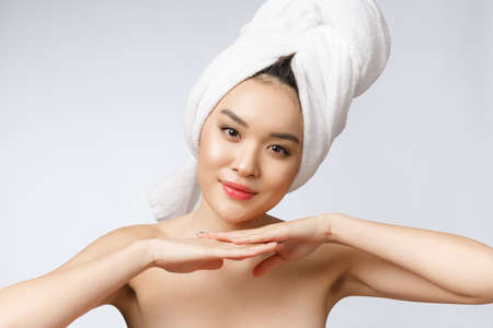 Beautiful Charming Asian young woman smile with white teeth, feeling so happiness and cheerful with healthy skin,isolated on white backgroundの写真素材