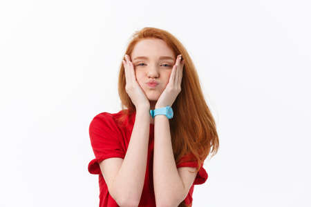 Good-looking female with sincere smile rejoicing her success having good mood showing her positive emotions. Woman with gentle smile.の写真素材