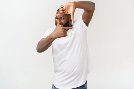 African man making frame sign with his hands isolate over white background.