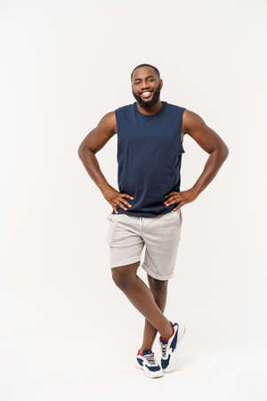 Young fitness african black man in sport wear cheering carefree and excited. Victory concept.の写真素材