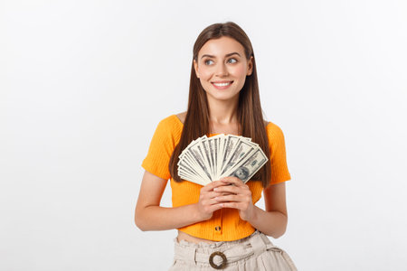 young business woman holding money isolated on white background.