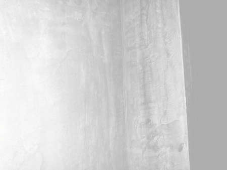 Grungy white background of natural cement or stone old texture as a retro pattern wall. Conceptual wall banner, grunge, material,or construction.の写真素材