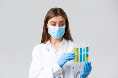 Covid-19, preventing virus, healthcare workers and quarantine concept. Excited professional doctor...
