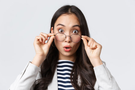 Business, finance and employment, female successful entrepreneurs concept. Close-up of surprised and...