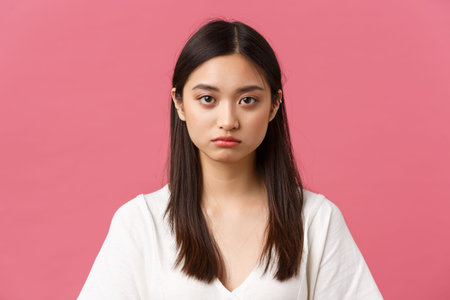 Beauty, people emotions and summer leisure concept. Close-up of gloomy and sad, tired young asian...