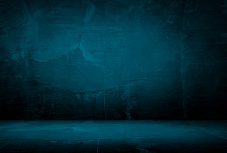 Vintage grunge blue concrete texture studio wall background with vignette.の写真素材