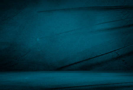 Vintage grunge blue concrete texture studio wall background with vignette.の写真素材