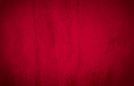 Abstract red wall background texture of an old cement wallの写真素材