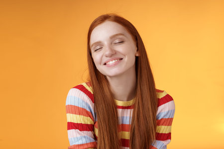 Tender sensual dreamy cute redhead feminine girl dreaming about tasty slice pizza close eyes smiling...