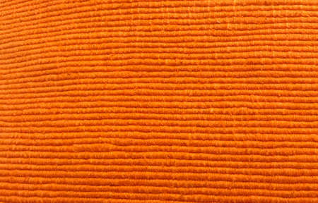 linen fabric rough texture. Christmas canvas for textiles, clothing, interior, creativity in Scandinavia, Provence, rustic style. Hard texture, knots are visible. vinous background.の写真素材