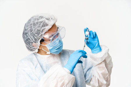 Portrait of asian woman doctor, nurse vaccinating patients, using syringe and covid-19 vaccine,...