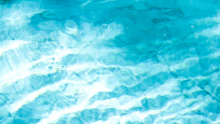water swimming pool texture and surface water on pool, reflection blue wave nature water on the...
