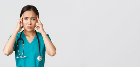 Healthcare workers, preventing virus, quarantine campaign concept. Exhausted asian female doctor...