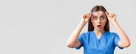 Healthcare workers, medicine, insurance and covid-19 pandemic concept. Surprised or shocked female...