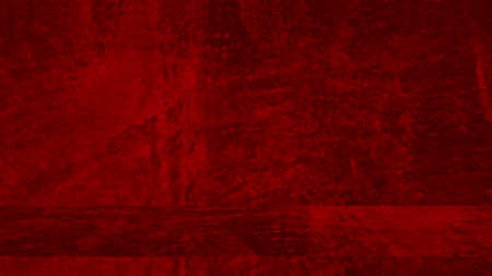 Grunge plaster cement or concrete wall texture red color with scratchesの写真素材