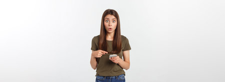 Laughing woman talking and texting on the phone isolated on a white background.
