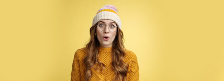 Surprised amazed charismatic good-looking young female student widen eyes wondered say wow amazed...