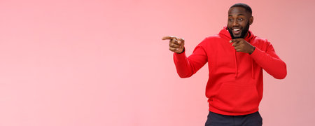 Hey mate what up. Portrait cheeky confident outgoing african american bearded man entering club see...