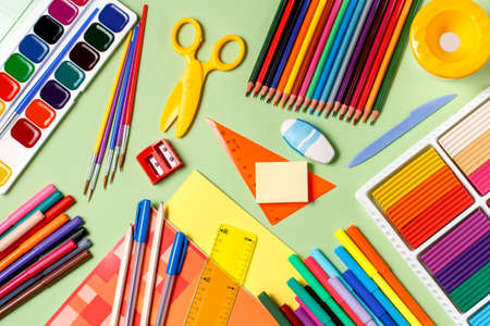Back to school concept. School supplies on a pastel backgroundの写真素材