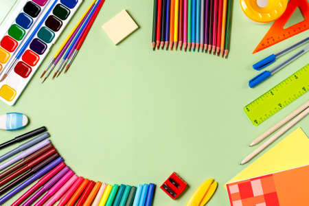 School background. Various school supplies on a desktop, copy spaceの写真素材