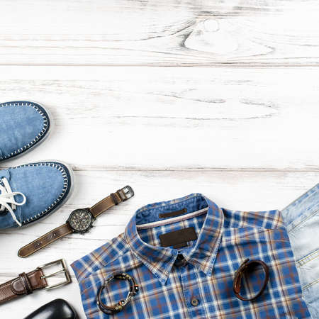 Mens casual outfit. Mens fashion clothing and accessories on white wooden background, flat layの写真素材