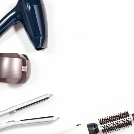 Various hair styling tools on white backgroundの写真素材