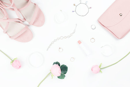 Fashion accessories, make up products, sandals and handbag on white background. Beauty and fashion...