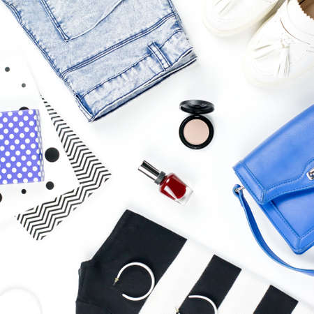 Casual style woman clothes and fashion accessories flat lay. Trendy patterns and prints concept. Top viewの写真素材