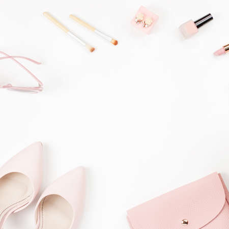 Female fashion accessories and cosmetics in pink color, flat lay.の写真素材