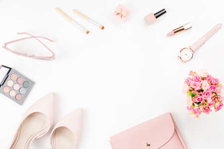 Female fashion accessories and cosmetics in pink color, flat lay.の写真素材