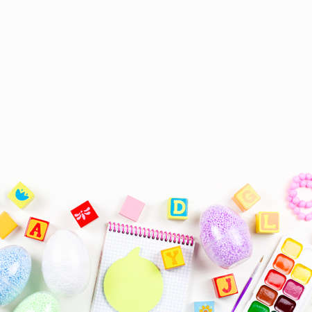 Child creativity concept flat lay. Various artistic tools for children on white desktop. Copy spaceの写真素材
