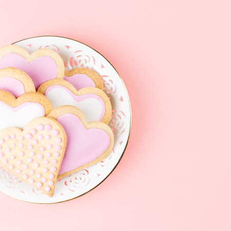 Valentines day cookies close up on pink background.の写真素材