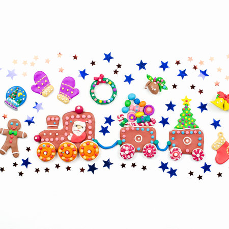 Christmas background with decorations. Santa, Christmas train with tree and sweets, snowman and...