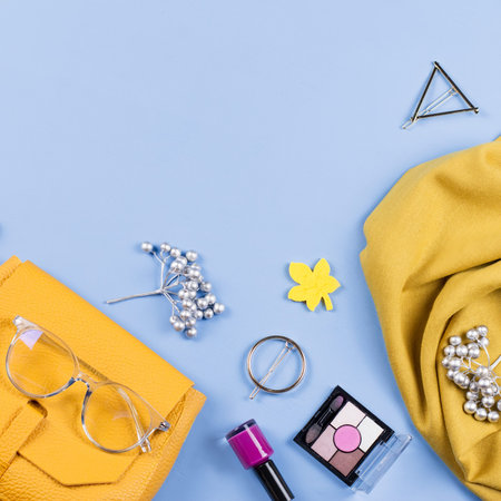 Woman fall clothes and accessories flat lay. Female autumn fashion concept.