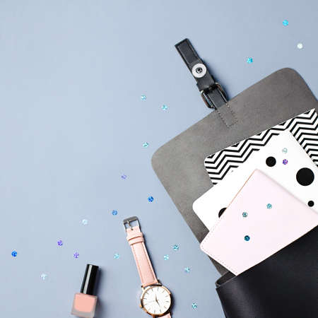 Black leather backpack, stationery and note books, back to school concept. Copy spaceの写真素材