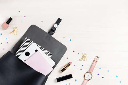 Black leather backpack, stationery and note books, back to school concept. Copy space, top viewの写真素材