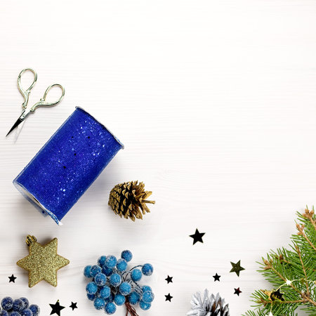 Preparation for Christmas concept. Blue and red Decorations and christmas tree lay out