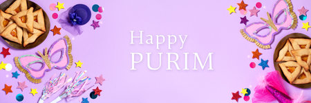 Purim carnival background with quote Happy Purim, traditional cookies, costume accessories and decor on pastel violet background, web banner, copy spaceの写真素材