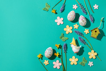 Easter border web banner with flower design eggs, hyacinths, flower decor on spring vibrant green background, Easter frame, top viewの写真素材