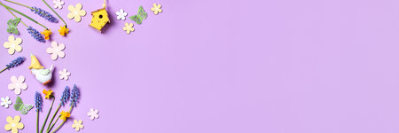 Easter card with flower design eggs, hyacinths, flower decor on pastel purple backgroundの写真素材