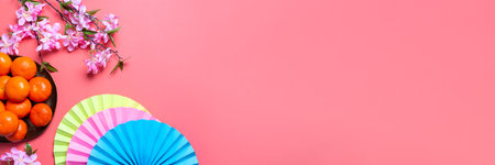 Chinese or lunar new year flat lay with paper decorations, mandarins and flowers on pinkの写真素材