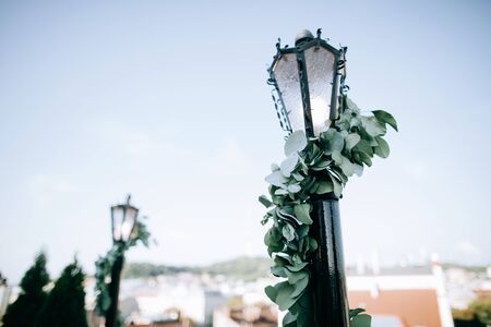 arch for the wedding ceremony on the roof of the houseの写真素材