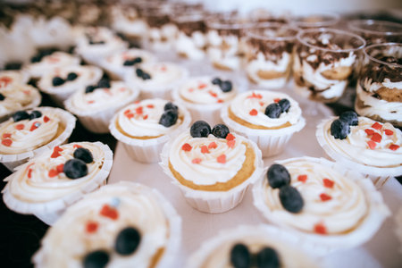 dessert with whipped cream and fresh berries on wedding candy bar