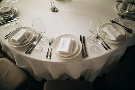 elegant table setting in restaurant on wedding party