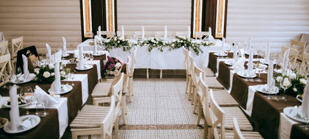 Beautiful wedding decoration, elegant table setting on wedding party in restaurant. Catering service
