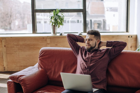 Young man working remotely at home